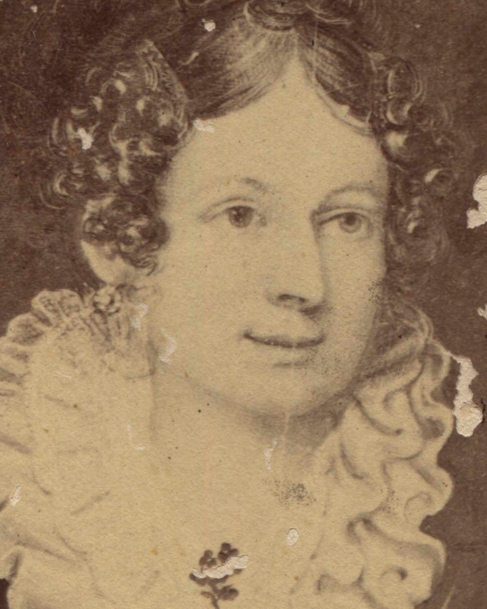 A faded 1830s portrait of a young woman, flat and grey with flecks of the surface missing.